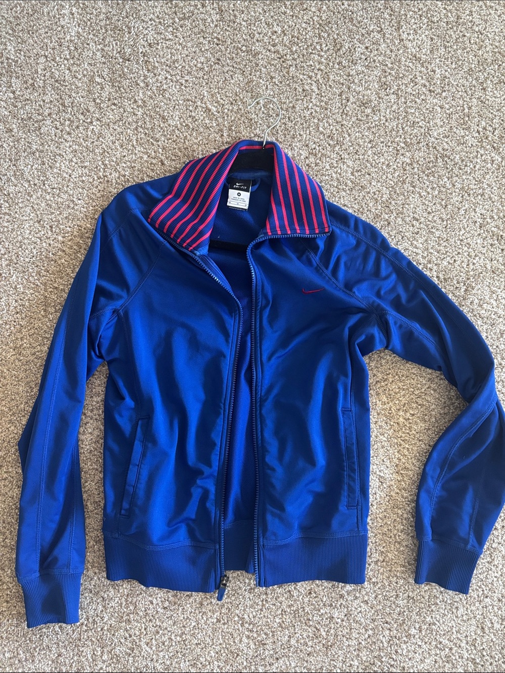 Nike Women's Blue Jacket with orange striped Collar